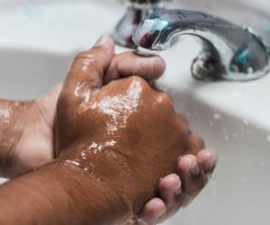 Why does soft water feel slippery?