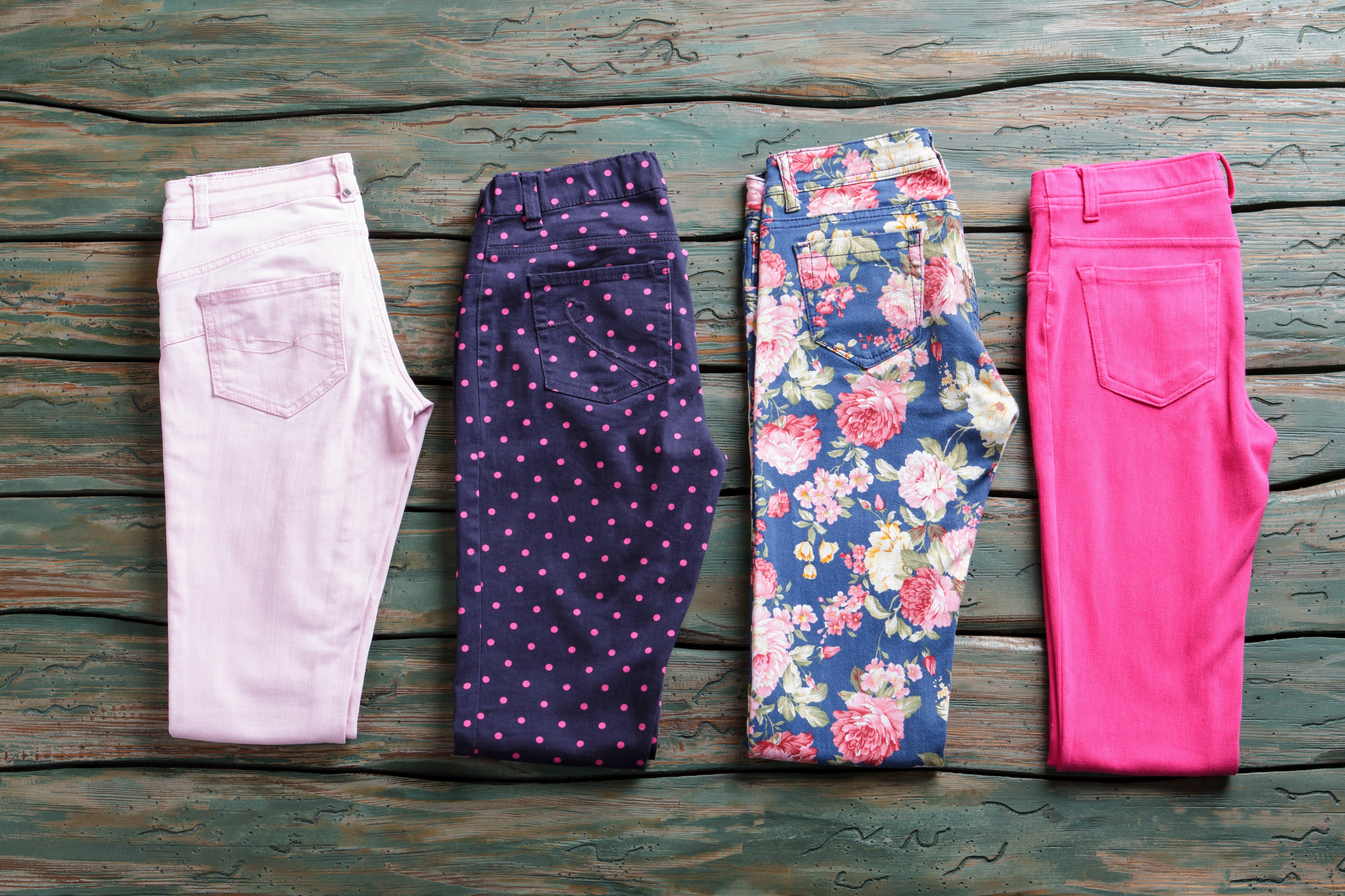 A row of colourful clothes with no hard water effect on clothes